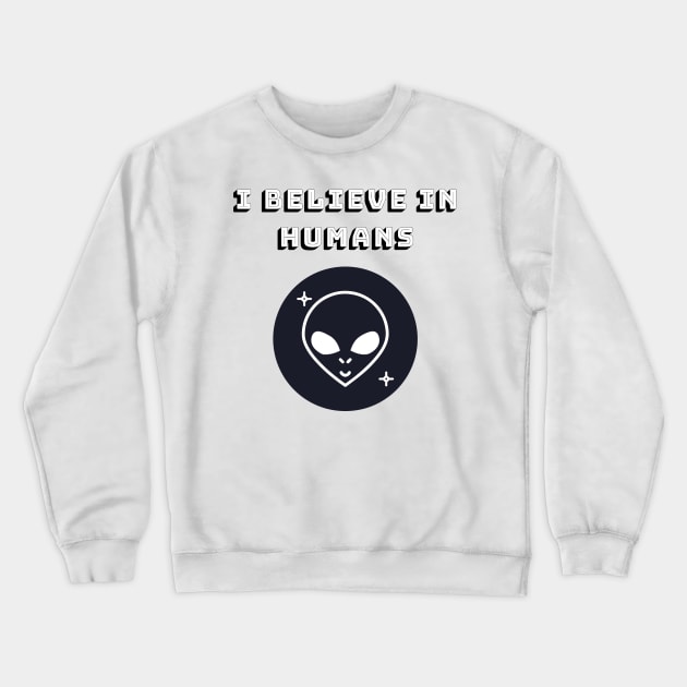 This Alien Believes In Humans Crewneck Sweatshirt by Just Kidding Co.